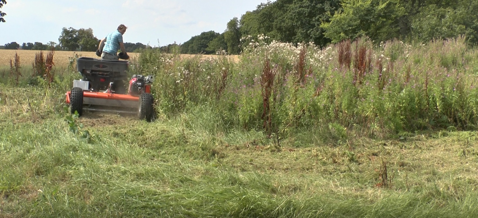 FM120 Trailing Wheels cutting thick vegetation.jpg